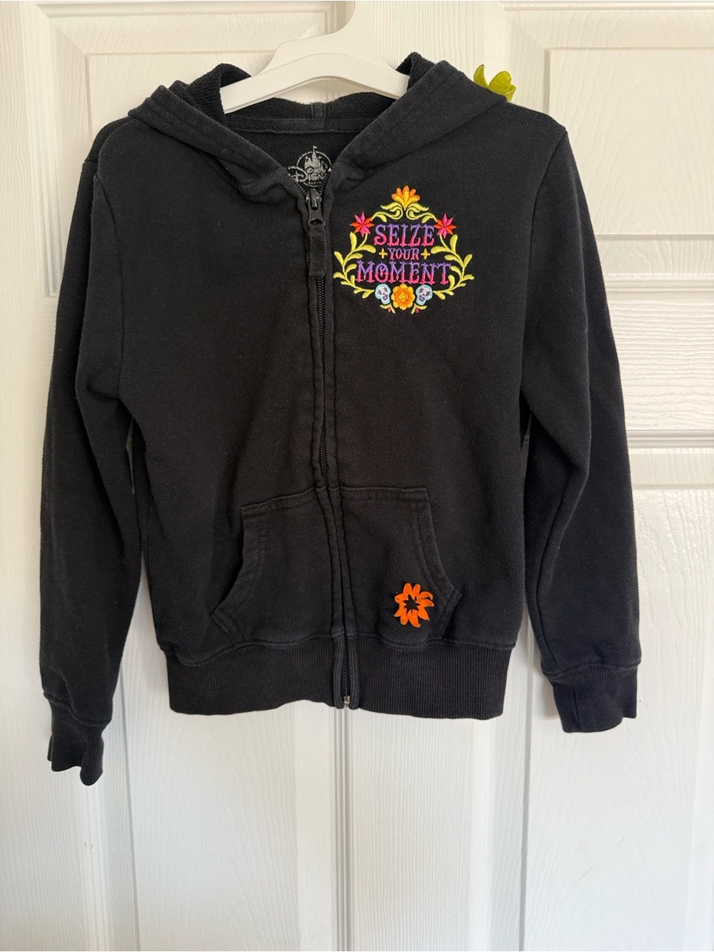 Kids size small  Black Zip-Up hoodie Disneyland parks Coco